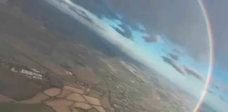 Paracaidistas captan un extraño arcoíris circular; un fenómeno natural que pocos logran ver