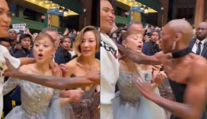 Fanático burla la seguridad y se lanza sobre Ariana Grande en la premiere de Wicked