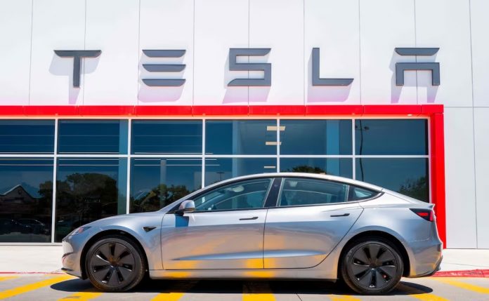 Y TESLA