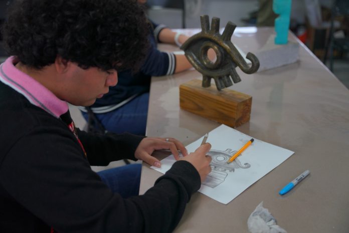 Y TALLERES