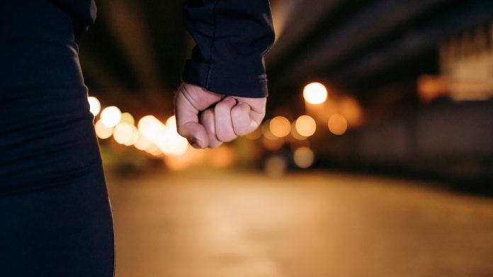 Hand of man with clenched fist